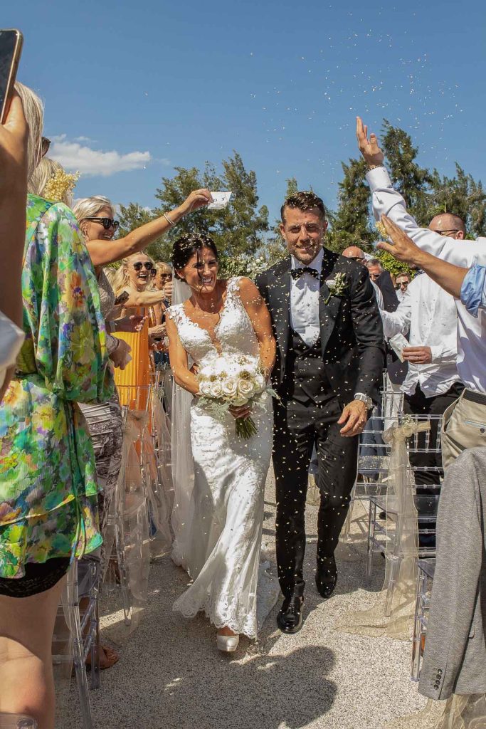 Couple walking through the golf fields at La Finca Resort