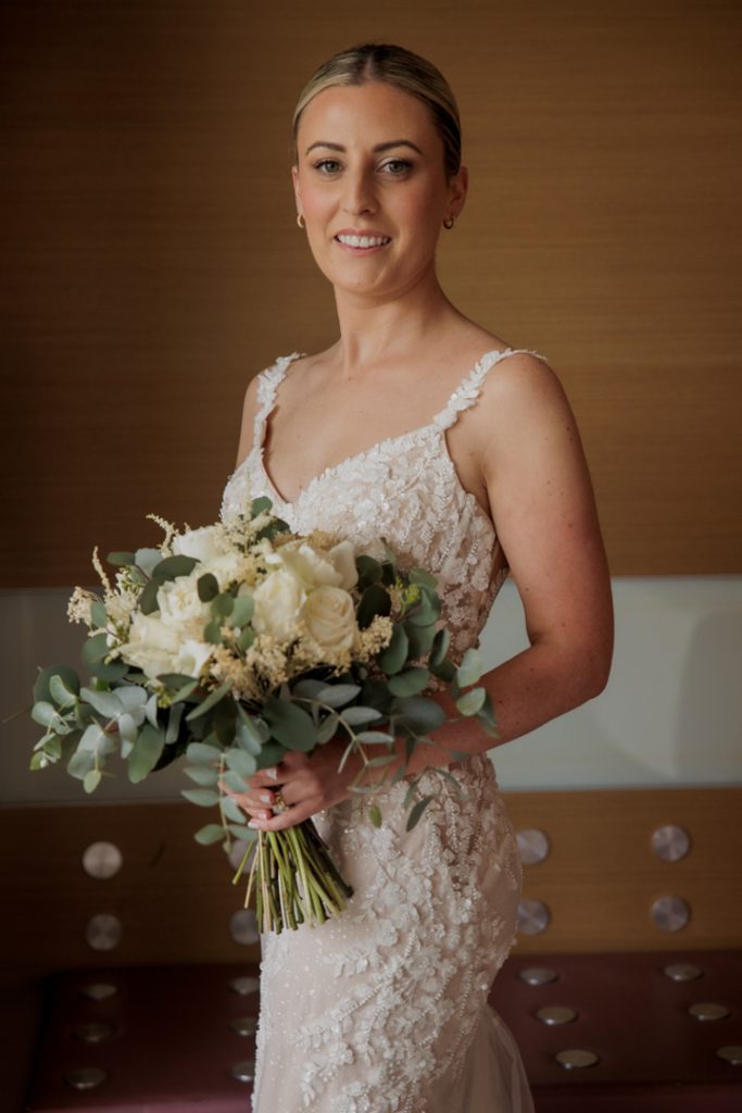 Bride holding bouquet at destination wedding La Finca Resort Algorfa