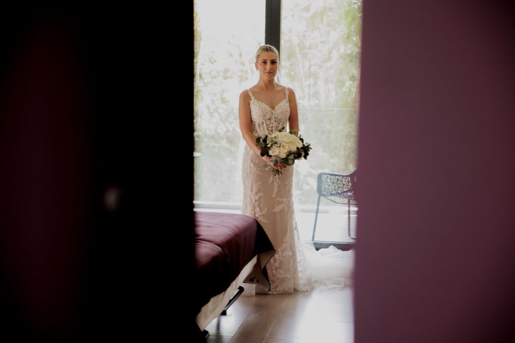 bride and brides maid holding bouquet