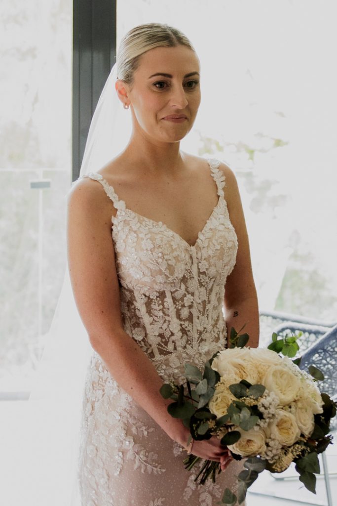 bride holding bouquet Father first look bride La Finca Resort wedding