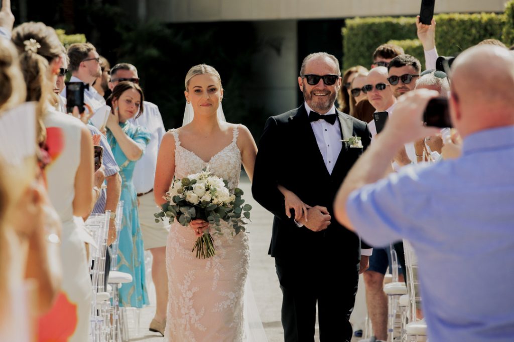 Bride walking down the aisle La Finca Resort Algorfa
